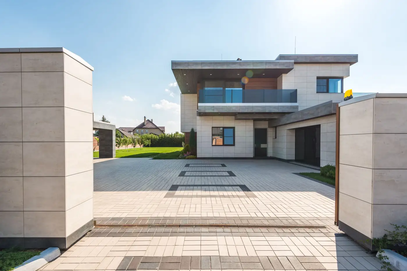 Modern double-storey home with a paved driveway